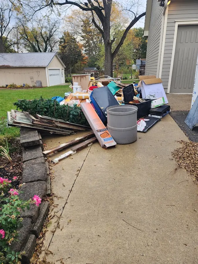 Dumpster being loaded with debris for 30 Yard Dumpster Rental in Suisun City